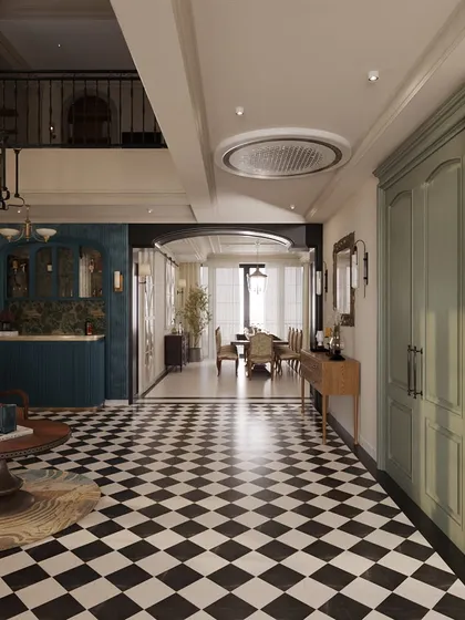 I love to create visual pathways that guide you through a home. The bold, classic checkerboard floor in this entryway immediately sets a sophisticated tone, leading the eye towards the living and dining areas. It’s a statement of quiet opulence that connects different zones with timeless style.