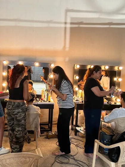 A candid shot from our couture fashion shoot today. The energy is high, and the looks are going to be unforgettable.