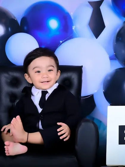 Meet the new boss! The 'Boss Baby' theme is a super fun and popular choice for first birthdays. I style the entire setup with a miniature suit, chair, and themed props to capture your little one's big personality.
