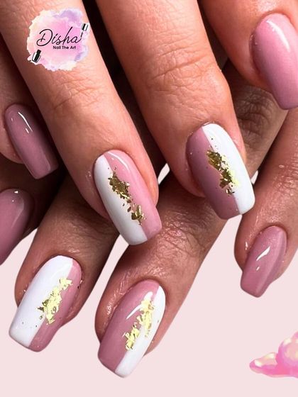 Nails that give you main character vibes. This design combines a dusty rose with a white and gold foil accent nail for a chic and modern look.