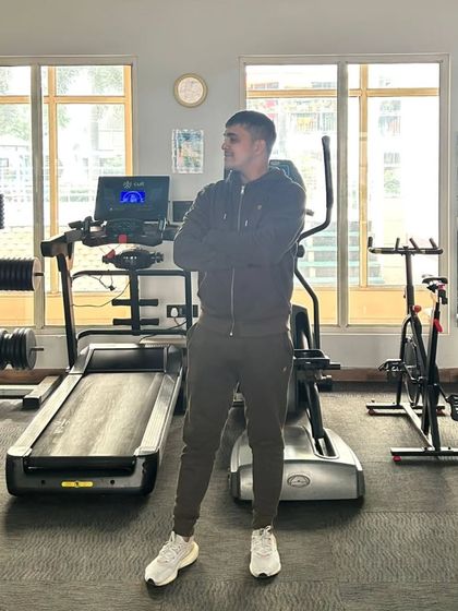 Looking to the side.