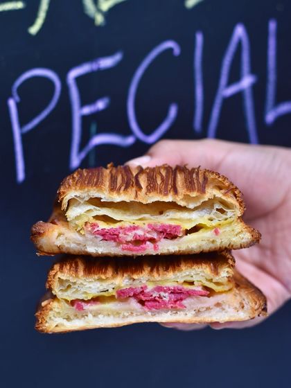A look inside our Spanish Ham & Cheese Pain Suisse. This weekend special features layers of savoury Spanish ham and cheese baked into our laminated croissant dough.
