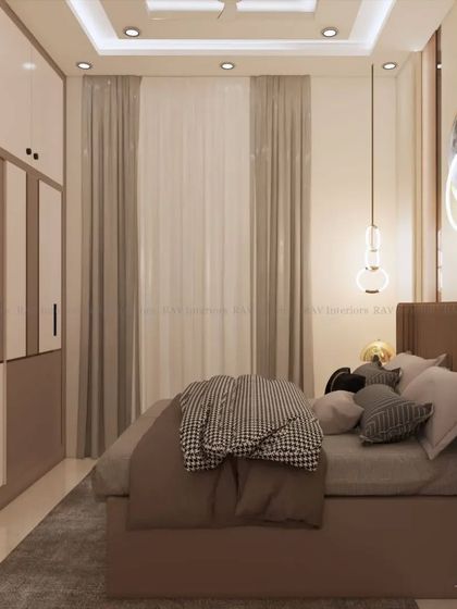 Another angle of the neutral-toned bedroom, showing the wardrobe and the overall calming ambiance.