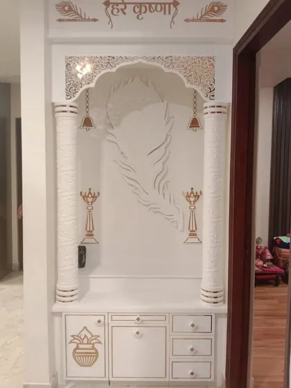 Here is the same Corian mandir without the lights on, showing the detailed inlay work.