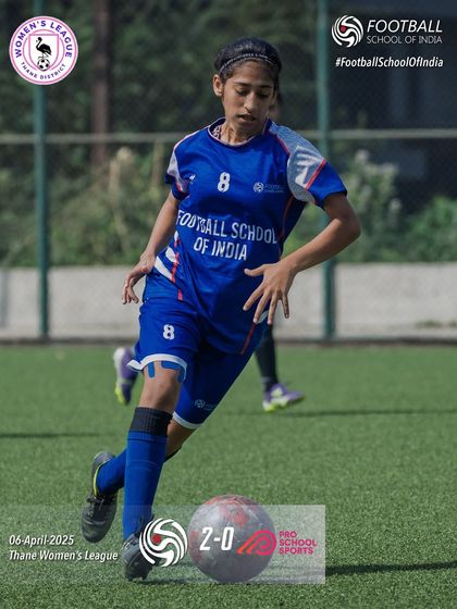 A player dribbles down the wing, showcasing the skill and confidence we build in our women's teams.