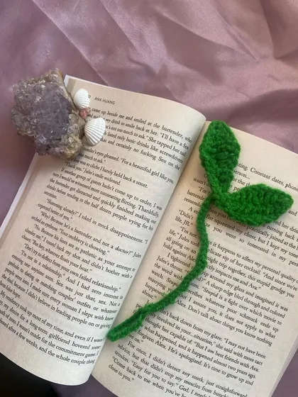 Here’s my leaf sprout tie being used as a bookmark. It’s gentle on the pages and looks super cute peeking out of your current read.
