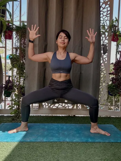 To honor the warrior goddess Maa Katyayani on Day 6, we practice Utkata Konasana (Goddess Pose). This pose grounds your energy, fires up your inner power, and reminds you that your strength is sacred.