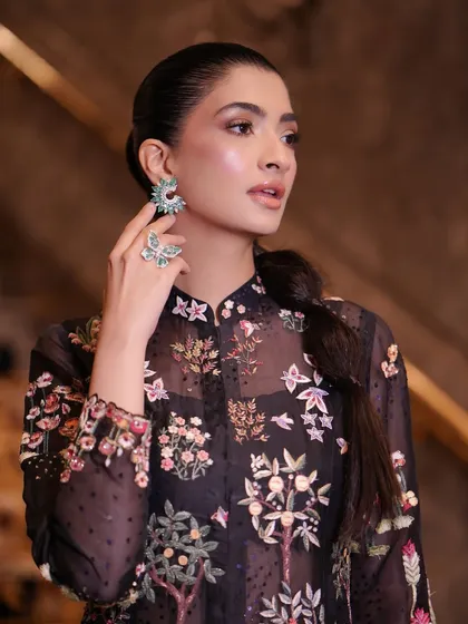 A close up of the sleek, sectioned ponytail I created for an attendee at India Couture Week. This hairstyle is modern, sharp, and complements the detailed outfit perfectly.