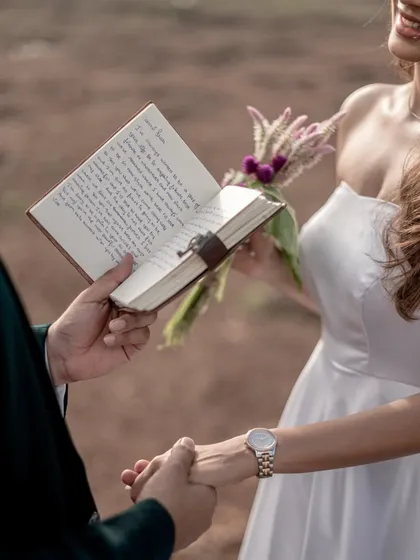 It's all in the details. A handwritten book of vows adds such a personal and timeless touch to a proposal. I make sure to capture these small, meaningful elements that tell the bigger story of your love.