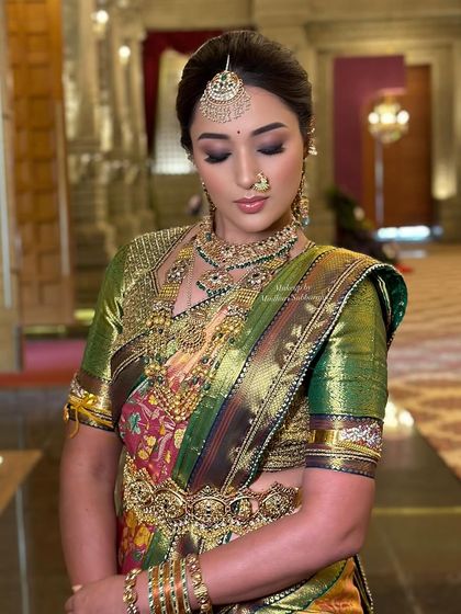 A close-up of the Muhurtham makeup, featuring a soft smokey eye and perfectly blended skin.