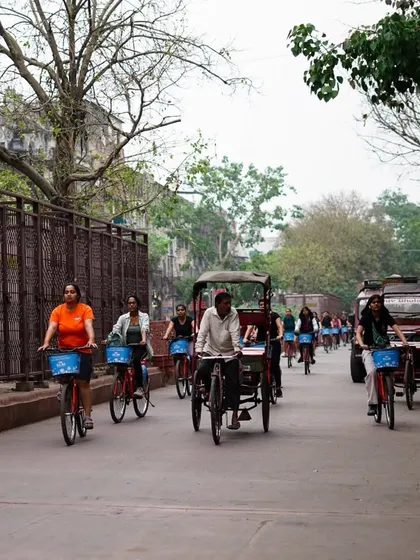 Our riders navigate the streets alongside cycle rickshaws, another form of sustainable transport. We are part of a larger ecosystem of green mobility in the city.