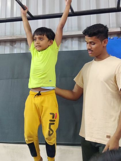 Elite Squad Gymnastics Academy - Kids Gymnastics Classes Working with Equipment photo 12
