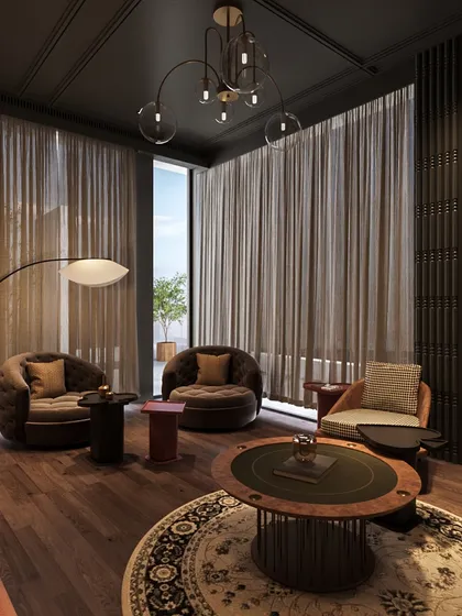A dedicated area for games, with a custom card table and comfortable, deep-toned armchairs. The space feels luxurious and perfect for entertaining.