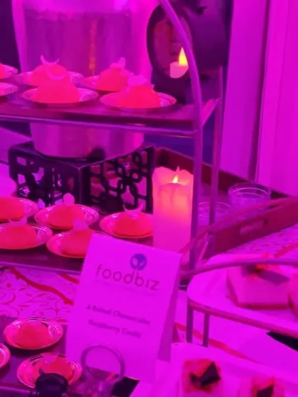 A multi-tiered display of delicate desserts and pastries. We pay close attention to presentation, ensuring every food station is a visual delight that contributes to the event's overall opulence.