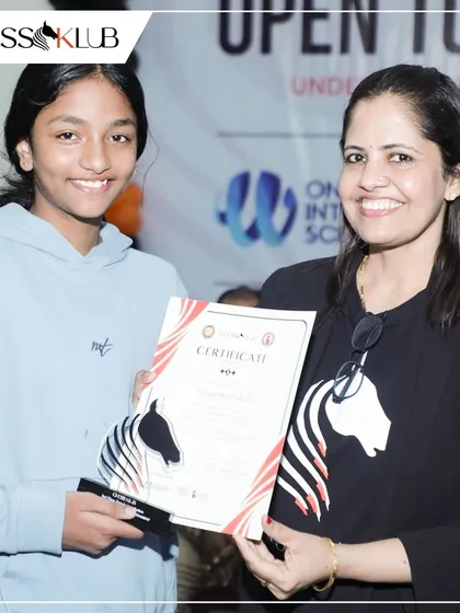A proud moment as one of our students receives her certificate and award. We partner with organizations like KSCA and BUDCA to give our players exposure to high level, competitive chess events in Bengaluru.