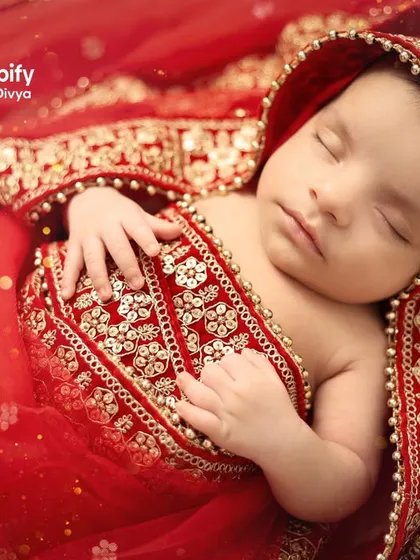 Another angle of the sleeping princess, showcasing the rich layers of the red fabric and the delicate pose of her hands. Every shot is composed to look like a piece of art.