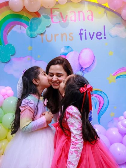 A heartwarming moment of family love in front of our unicorn backdrop. These are the precious memories we love to help create.
