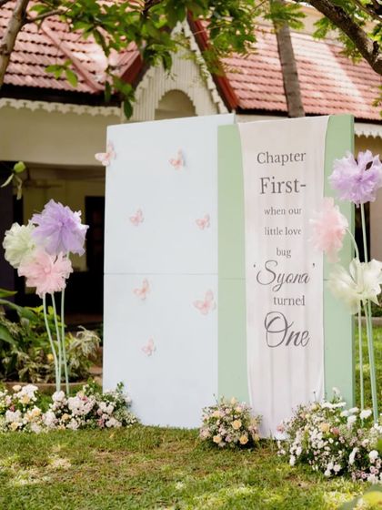 Another view of the beautiful storybook prop, which serves as a perfect photo backdrop for a first birthday party.