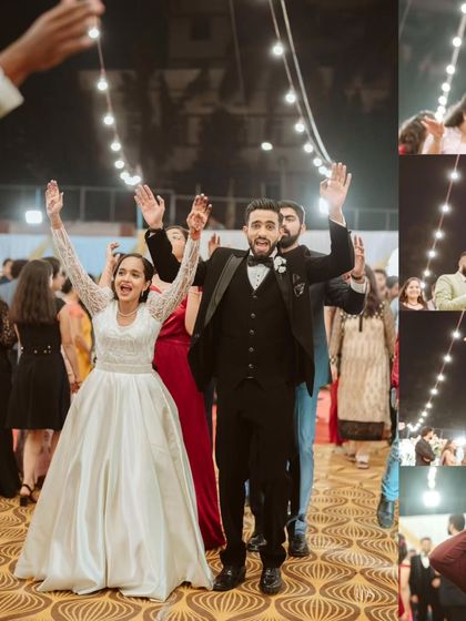 A wide shot capturing the energy of the crowd as they dance along with the couple. The string lights create a festive, open-air dance hall vibe.