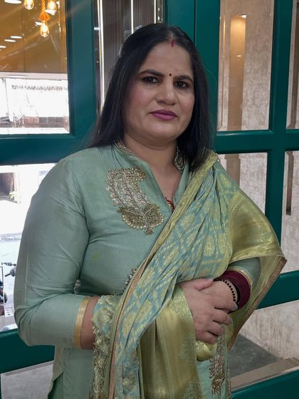 A mother-daughter duo getting ready at our salon. We provided age-appropriate, elegant makeup for both of them for their special family function.