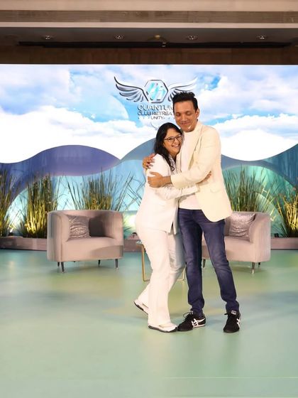 A heartfelt hug with my mentor on stage. The support we give and receive in this community is genuine and powerful.