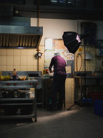 Every dish has a story, and it starts right here in our kitchen. This shot captures the dedication of our chefs as they pour their hearts into every meal they create.