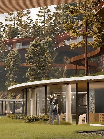 The design of the public buildings uses locally sourced stone and wood, grounding the project in sustainability and a connection to its location.