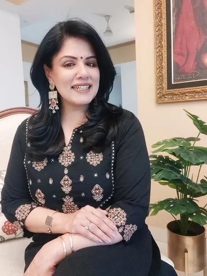 A close-up of the black kurta set, highlighting the heavy embroidery. This is why I chose to wear only statement silver earrings and skip a necklace, to avoid a cluttered look.