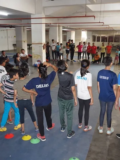Students gathered for instructions during the summer camp. Our camps are structured to provide a comprehensive learning experience over a short period.
