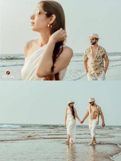 A beautifully composed shot of the couple walking hand in hand on the beach. This type of image is perfect for telling a visual story of their journey together.
