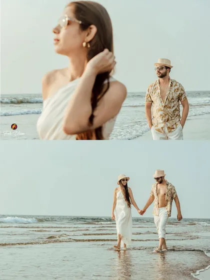 A beautifully composed shot of the couple walking hand in hand on the beach. This type of image is perfect for telling a visual story of their journey together.