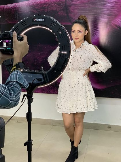 A behind-the-scenes shot of a student portfolio photoshoot. We provide professional setups with proper lighting to help students build a high-quality portfolio.