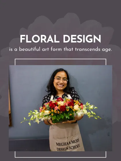 A student holds her beautiful, horizontally-designed arrangement. This showcases the variety of styles and techniques my students learn.