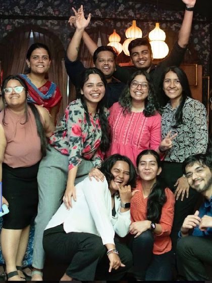 A big group photo capturing the fun and chaotic energy of a great night out.