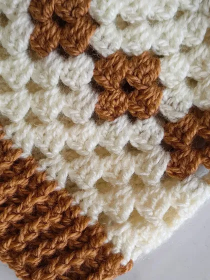 A detailed shot of the diamond motif. This technique, known as tapestry crochet, is a fun way to introduce pictures and patterns into your work.