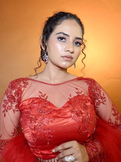 This glossy, waterproof makeup look is perfect for a party or reception. The skin is luminous, and the eyes have a beautiful sheen. This was a look I demonstrated for my students.