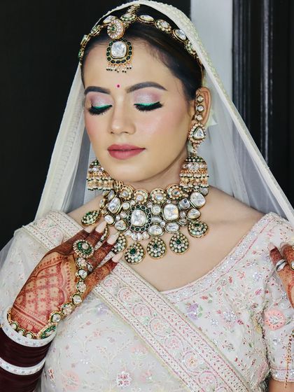 A close-up shot of the bride, her makeup looking absolutely perfect.
