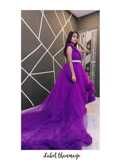 For a truly dramatic look, I created this purple gown with a long, ruffled trail. It's perfect for proms, photoshoots, or any event where you want to make a statement.