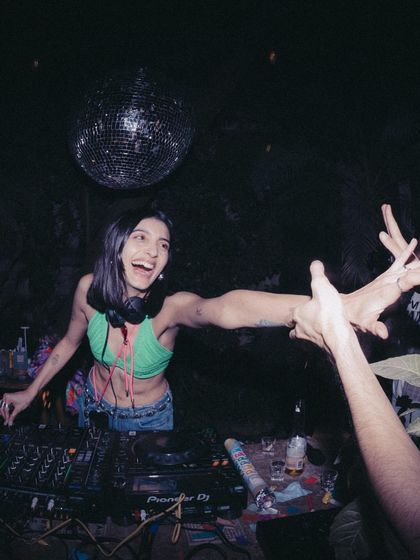 Connecting with the crowd is the best part of my job. This photo captures a moment of pure joy and connection during one of my sets.