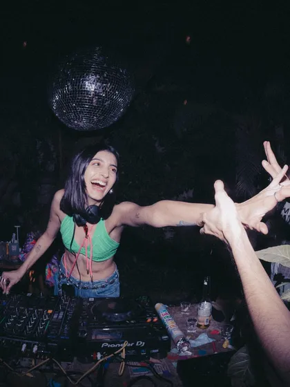 Connecting with the crowd is the best part of my job. This photo captures a moment of pure joy and connection during one of my sets.