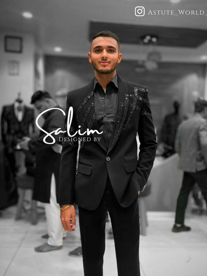 A client in a simple but sharp black suit with subtle sequin detailing on the lapel. This shows that embellishments can be understated and elegant.