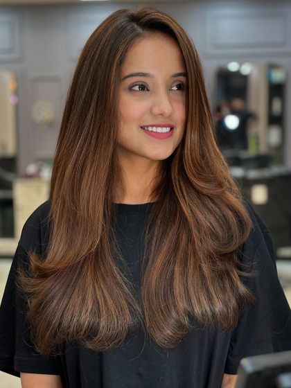 Another shot of this beautiful, classic hair color. The tones are warm and rich, perfect for Indian skin tones.