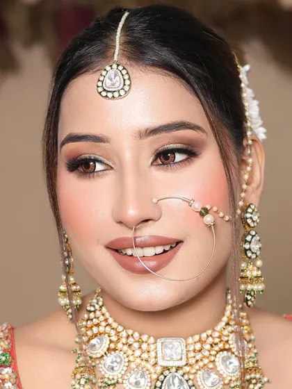 Another angle of the soft brown smokey eye look, demonstrating the student's skill in creating a look that enhances the model's natural features.