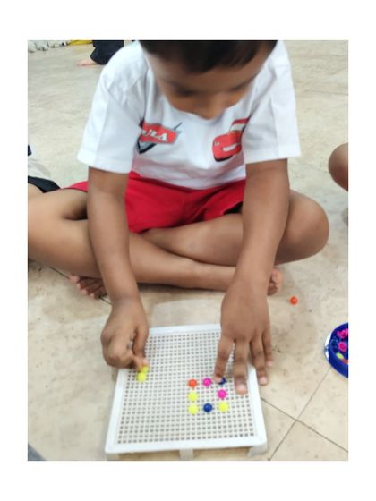 Each peg placed is a small victory in coordination and concentration. This hands-on game is wonderful for building focus.