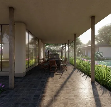 A render illustrating the covered verandah of the Alibag villa, showing how the interior space flows into the garden and pool area. We design the landscape to be an extension of the home.