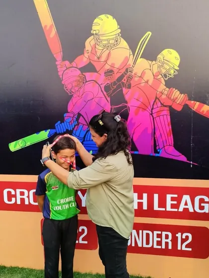 The support of parents is crucial in a young cricketer's journey. A beautiful moment captured at our tournament.