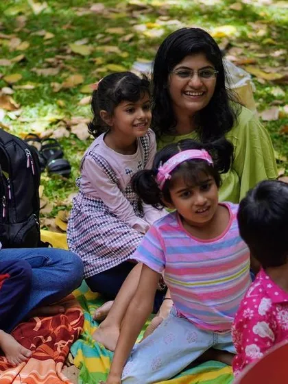 A collection of photos showing the engaged faces of both children and parents. Our story circle is a shared space, and it's wonderful to see adults as captivated as the little ones.