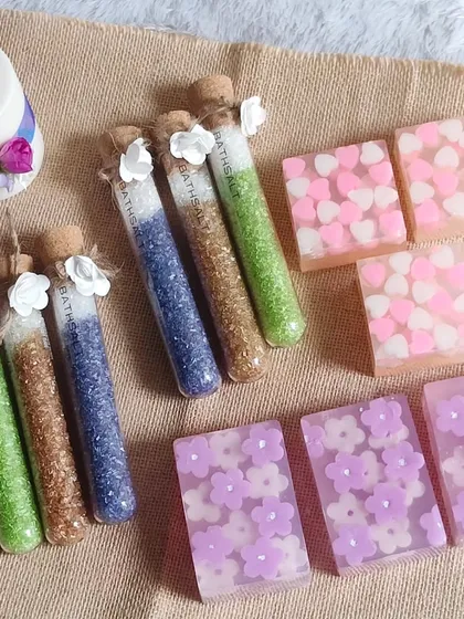 Another shot of the handmade soaps, bath salts, and pillar candle, highlighting their suitability for corporate gifting and bulk orders.