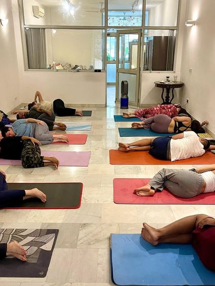 A moment of rest and integration during a breathwork workshop. Savasana is just as important as the active part of the practice.