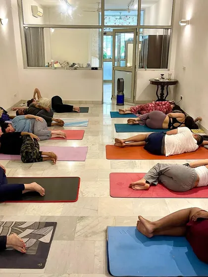 A moment of rest and integration during a breathwork workshop. Savasana is just as important as the active part of the practice.